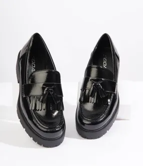 Chunky black patent loafers