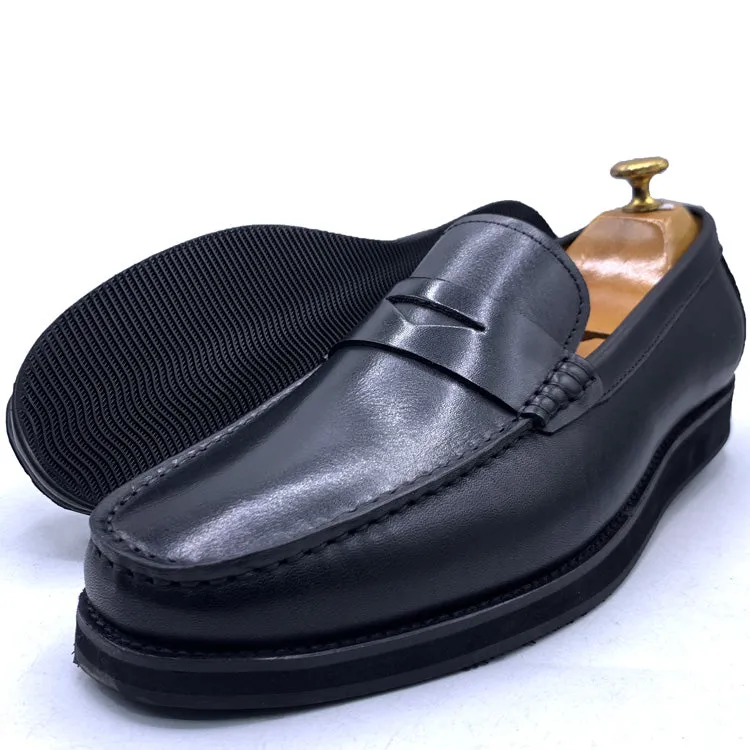 GB men's black loafers made of leather, embodying timeless elegance