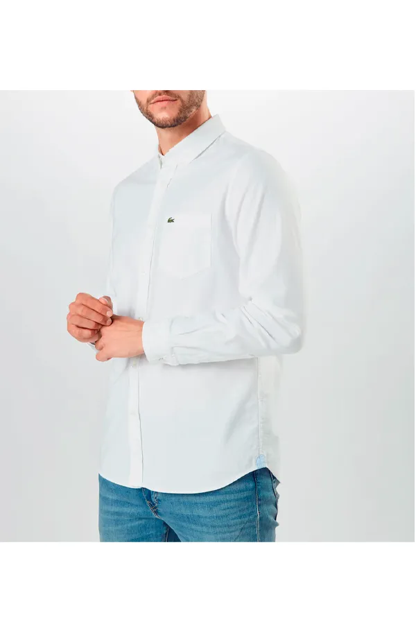 Lacoste white pocket shirt with logo.