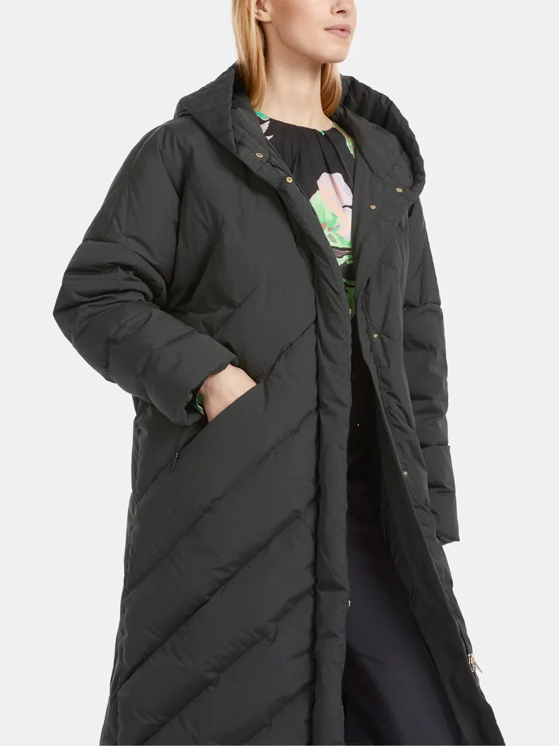 Quilted coat with down filling - black.