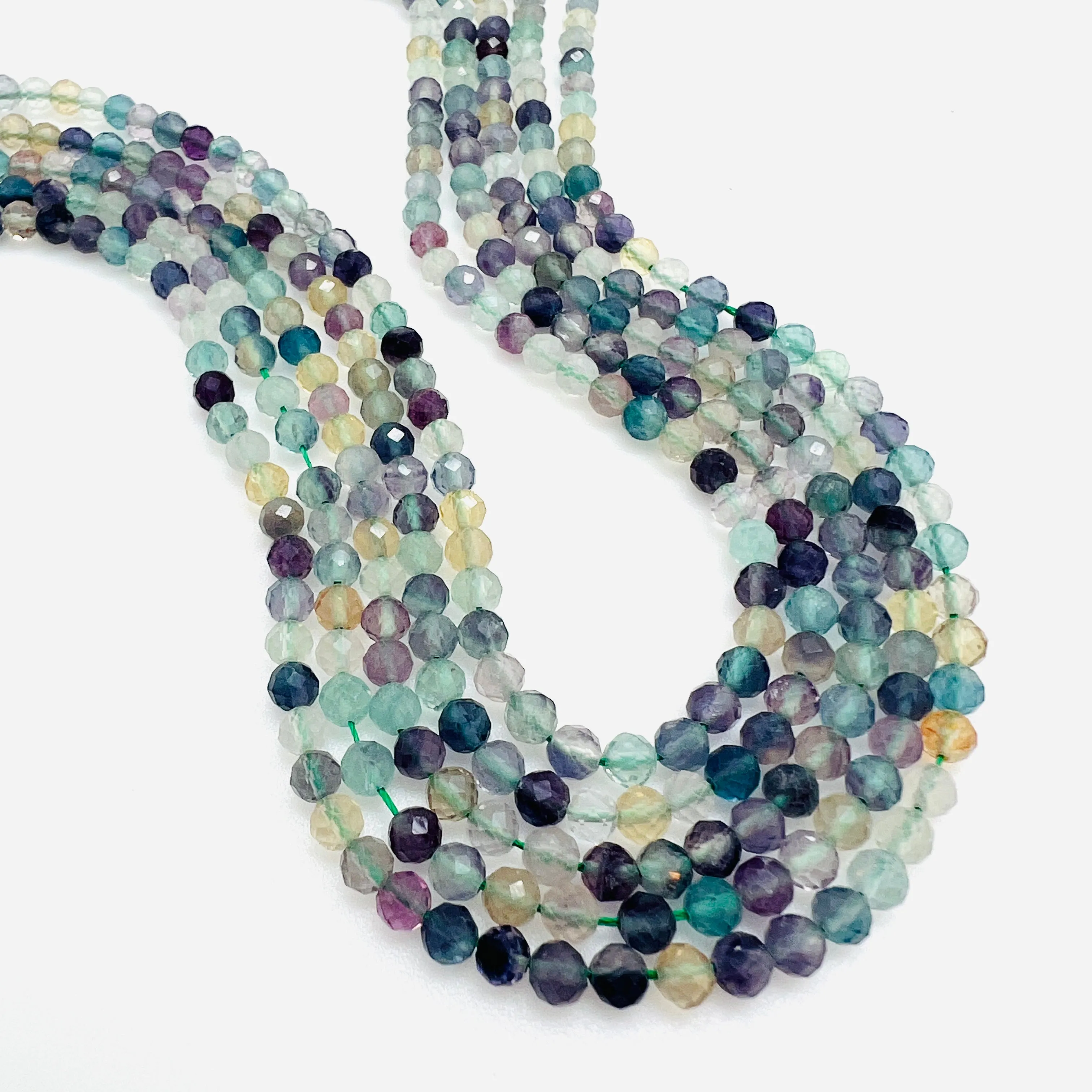 Rainbow Fluorite Faceted Rounds - 4mm: Rainbow Fluorite 4mm Faceted Rounds