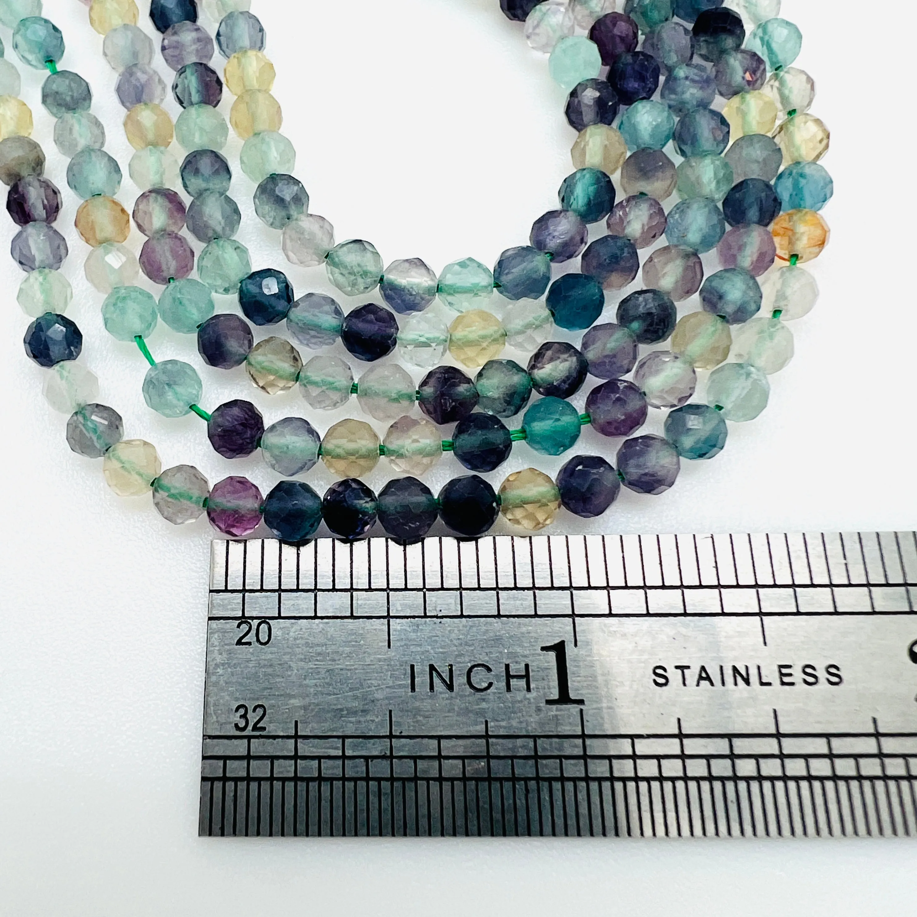 Rainbow Fluorite Faceted Rounds - 4mm: Rainbow Fluorite 4mm Faceted Rounds