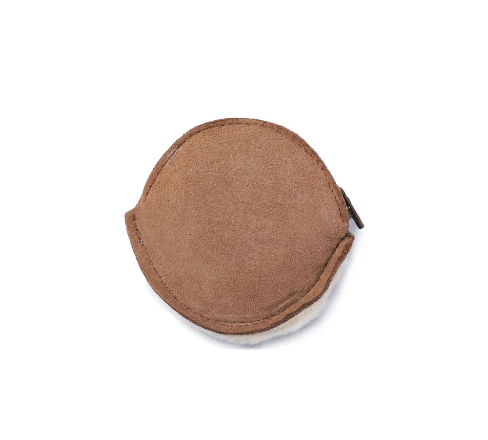 Urban UGG sheepskin fluffy purse with round zip closure in wool.