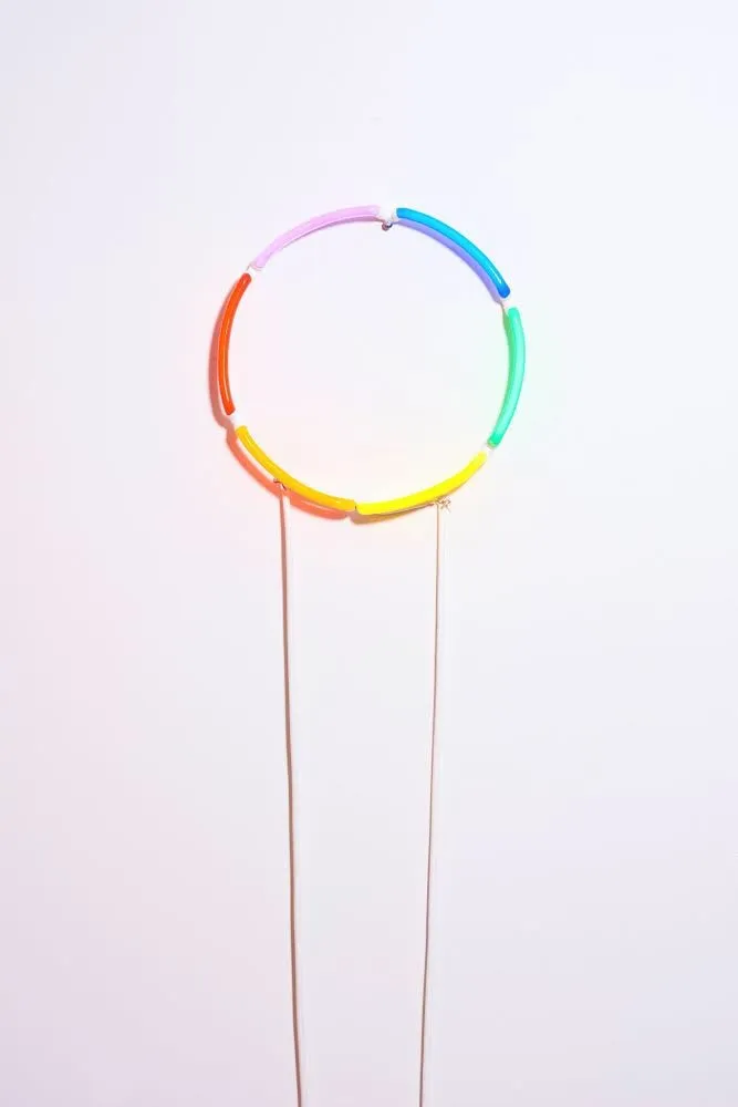 Vibrant Neon Sign with Rainbow Halo